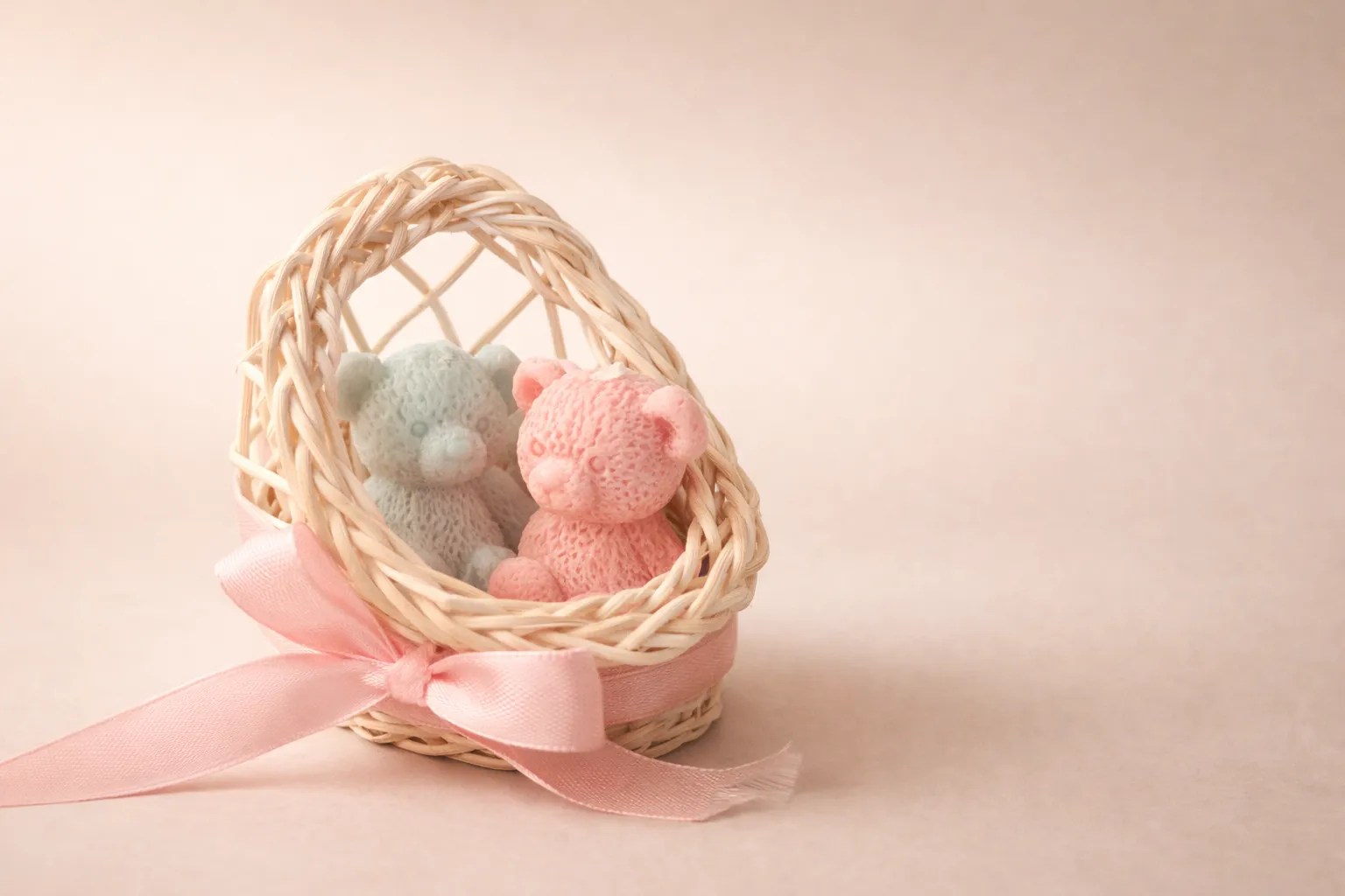 Bear-shaped candles in a wicker basket
